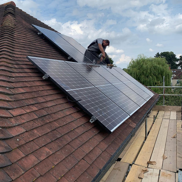 Our work on a roof with solar panels being fitted.