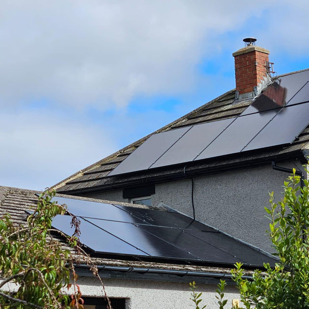 Our work fitting solar panels on a roof.