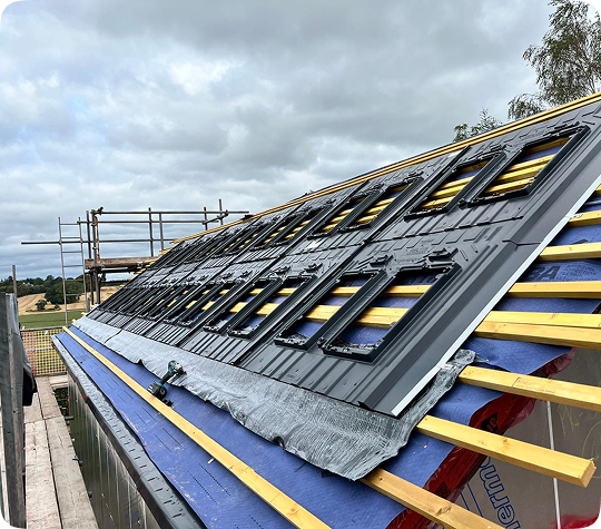 Solar panel fitting on a roof.