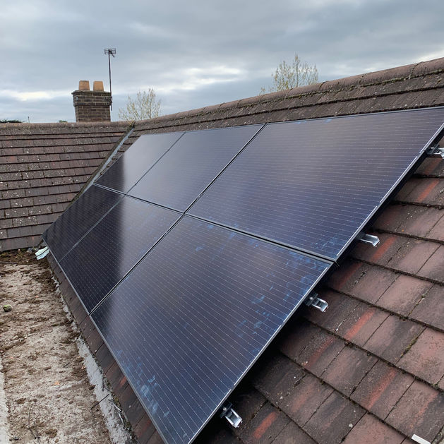 our work with solar panel on a roof.